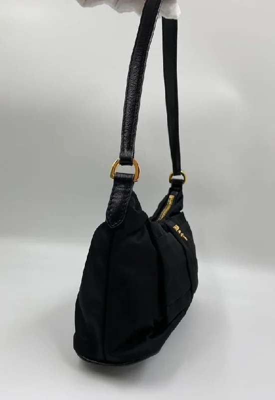 Prada Logo - Printed Canvas Crossbody in Khaki for TravelersPrada Black Nylon Mini Bow Bag