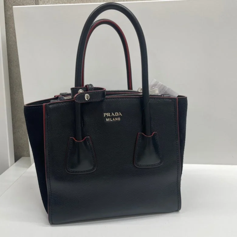 Prada Laser - Cut Canvas Bag in White with Floral DesignPrada Twin Pocket Tote Bag, Black, Leather