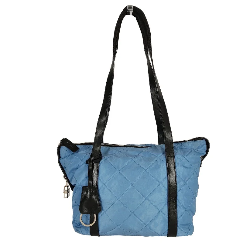 Prada Logo - Printed Canvas Crossbody in Khaki for Day TripsPrada matelasse shoulder Bag in light blue nylon