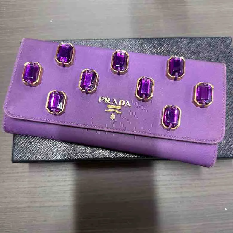 Prada Metallic Leather Handbag in Copper for TrendsettersPrada Nylon Bijou Wallet, Purple Leather