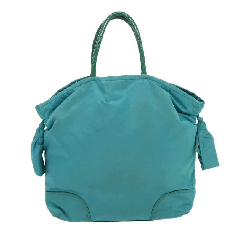 Prada Laser - Cut Leather Bag in Black with Intricate DesignPrada Hand Bag Nylon Turquoise Blue  hk434