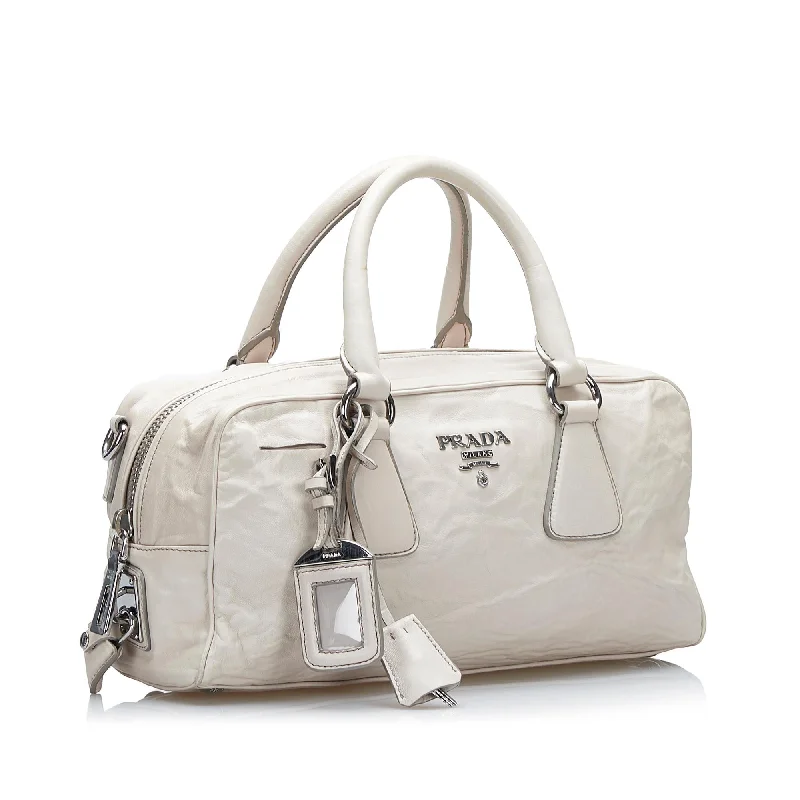 Prada Woven Raffia and Leather Bag in Natural and TanPrada Vitello Daino Satchel E9BlyJ